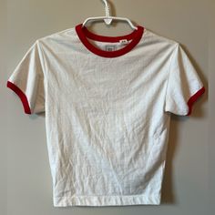 -Urban Outfitters Bdg Shirt With Red Outline -Size: Medium -Unworn (Mint Condition) -Comfy Trendy Red Cotton Shirt, Red Cotton Trendy Shirt, Trendy White T-shirt From Urban Outfitters, Retro White Tops From Urban Outfitters, White Casual Tops From Urban Outfitters, Urban Outfitters White Casual Top, Retro Cotton Tops From Urban Outfitters, Retro Cotton Tops By Urban Outfitters, Urban Outfitters White Relaxed Fit Top