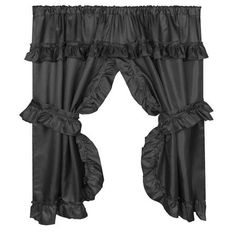 a black curtain with ruffled edges on a white background