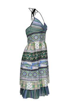 Embrace summer with this charming Kay Unger halter dress! The vibrant green and multi-color design exudes chic style, perfect for a summer evening dinner. Made of luxurious silk, pair it with black sandals and dangle earrings for a refined yet playful look. Size 6 Shell 100% Silk Lining 100% Polyester Invisible zipper back Halter tie neckline Bust 34" Waist 30" Shoulder to hem 43.5" Summer Vacation Silk Halter Dress, Green Halter Neck Cocktail Dress, Silk Halter Neck Dress For Vacation, Multicolor Summer Halter Dress For Party, Green Silk Halter Neck Dress, Multicolor Summer Halter Dress For Garden Party, Summer Multicolor Halter Dress For Garden Party, Silk Halter Dress For Summer Beach, Chic Multicolor Halter Dress For Summer