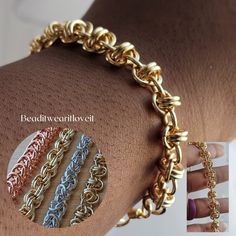 the gold chain bracelet is being displayed on someone's arm and has four different colors