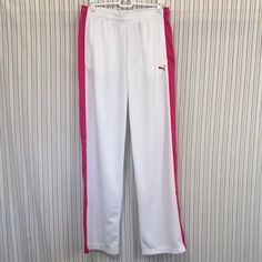 These White Pants Have Hot Pink Side Stripes And Puma’s. They Have An Elastic Waist With Inside Draw Strings. They Have Pockets. A Size Large. Measurement’s: Waist Laying Flat 15” Inseam 33” Nwot White Full-length Sweatpants Sportswear, White Full-length Sportswear Sweatpants, White Full-length Sportswear Pants, White Fitted Sweatpants Sportswear, White Full Length Sweatpants For Sports, Sporty Stretch White Pants, Sporty White Stretch Pants, White Full-length Sporty Bottoms, White Full Length Sporty Bottoms