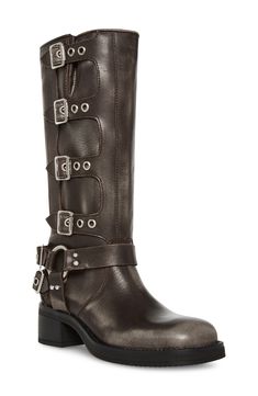 Complete your look with the suave moto style of a mid-calf boot furnished with abundant buckle straps. 2" heel 12" shaft; 16" calf circumference Leather upper/synthetic lining and sole Imported Edgy Boots, Buckle Boot, Steve Madden Boots, Harness Boots, Trending Boots, Studded Boots, Moto Style, Buckle Boots, Biker Boots