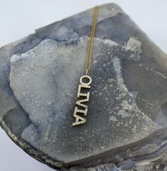 This 14k personalized diamond name necklace is the perfect gift for the bridal party, someone special, or yourself.* All letters are capital.__________________________________________M A T E R I A L & L E N G T HAvailable in 14k Yellow Gold, 14k Rose Gold, 14k White Gold, Sterling SilverThickness: 1.2mm / 0.05"InitialsLowercase: 4 mmCapital: 8 mmDiamond: 0.10 ct. - 0.30 ct. depending on the nameColor: GQuality: SI-VSAdditional Notes:• Non-Conflict Diamonds• Made in the USA Custom Name Diamond Nameplate Jewelry, Personalized Sterling Silver Diamond Necklace For Wedding, Anniversary White Gold Name Necklace With Diamond Accents, Personalized Diamond Nameplate Jewelry, Anniversary White Gold Name Necklace With Diamonds, Personalized Diamond Jewelry For Mother's Day, Personalized Diamond Wedding Necklace, Diamond Nameplate Jewelry With Initials, Diamond Nameplate Necklace With Diamond Accents