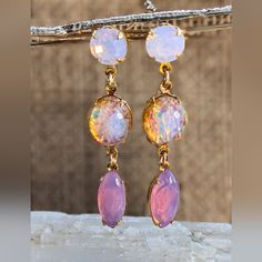 Here Is A Long Dangle/Drop Down Earrings Made With: Crystal In Pink Opal/Rosewater Is Located At The Top. The Center Is A Pink Fire Opal, Which Is Made With Czech Glass. The Bottom Is Pink Opal Made With Czech Glass. (Please Check Out My Listings For Matching Necklace And Bracelet) Measurement: 8mm Round, 8mm Round, 15x7mm Navette. Please Study The Length Of This Earrings, As It Approx Two Inches. And For Some, This Can Be Too Long. Earrings Are Brand New. The Base Material Is 18k Gold Plated, A Matching Necklace And Bracelet, Opal Jewelry Earrings, Pink Fire, Fire Opals Jewelry, Large Statement Earrings, French Hook Earrings, Link Earrings, Necklace And Bracelet, Drop Dangle Earrings