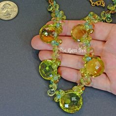 "DESCRIPTION: Thank you for coming in! A breath-takingly beautiful necklace made of an assortment of natural gemstones! You can find Apatite, lemon quartz and honey citrine in this one necklace! Premium quality gemstones finished with gold filled headpins and 18k solid yellow gold clasp! 19.5\" gorgeous necklace, 348.65 carats! You'll get the necklace you see! SIZE: 18.2mm-23mm lemon quartz coins. GRADE: Transparent COLOR: Multi" Cluster Necklace, Lemon Quartz, Beautiful Necklace, Gorgeous Necklaces, Wow Products, Solid Yellow, Rose Cut, Citrine, Beautiful Necklaces