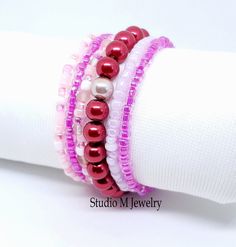 Hot Pink And Red Bracelets, 6 Loose Stretch Bracelets, Mix & Match Stacking Bracelets, Red Pearl Stretch Bracelet, Girlfriend Gift 4mm pink glass with 8mm red glass pearl bead stretch bracelet set. You will receive 6 bracelets. #B55 Wanna See More? Click below for other items available: http://www.etsy.com/shop/StudioMJewelry Shipping: All jewelry pieces are ready to ship. Items are shipped to your Etsy address, via USPS First Class mail with tracking and delivery information. **Thanks for visit Bracelets Red, Red Pearl, Stacking Bracelets, Red Bracelets, Girlfriend Gift, Pink And Red, Beaded Stretch Bracelet, Pink Glass, Red Glass