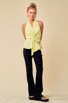 Add some fresh hues to your look for the new season with this halter top. Featuring a yellow floral linen material with twist details and a halter neck, it's perfect. Pair with white jeans and heels for an easy elevated look. Yellow Halter Top For Spring Vacation, Chic Cotton Halter Top For Day Out, Chic Yellow Halter Top For Spring, Chic Spring Halter Top For Day Out, Chic Spring Vacation Halter Top, Chic Spring Halter Top For Vacation, Chic Stretch Halter Top For Spring, Trendy Yellow Halter Top For Summer, Chic Yellow Halter Top For Summer