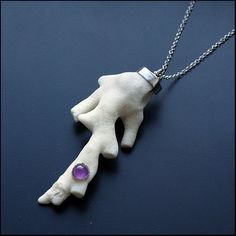 This necklace shows beautiful white sea coral which I found on the carribean beach in Mexico. In fact this is the only ecological way to use coral.  I added amethyst cabochon set in serrated edge bezel. The coral is set in sterling silver.  I used epoxi - patch (glue) made in USA.  Lenght of coral is 6,7 cm, lenght of chain is up to you - please write me a note. White Sterling Silver Amulet Necklace, Hand Cast White Sterling Silver Jewelry, White Amethyst Pendant Necklace, White Amethyst Pendant Jewelry, Unique Amethyst Round Pendant Necklace, Beach In Mexico, Copper Belt, The Carribean, Fox Pendant