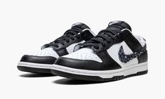 The Women’s Nike Dunk Low “Black Paisley” is a women’s-exclusive colorway of the vintage basketball shoe that modifies the its iconic Swoosh branding in an interesting way.  The “Black Paisley” is one of multiple “Paisley” Dunks released for women in 2022, and one of the most versatile, for that matter.  The shoe is designed in the same two-tone color block of many legendary Dunk styles, albeit with a modified black paisley Swoosh on the sides that replaces the model’s standard leather branding. Paisley Dunks, Womens Dunk Low, Leather Branding, Vintage Basketball, Monochromatic Outfit, Tenis Nike, Monochrome Outfit, Casual Sneakers Women, Nike Womens