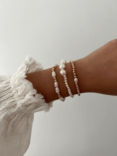 6.5 inch bracelet that stretches Made with freshwater pearls & 14k gold-filled beads Pearl Stretch Bracelet, Coastal Beaded Bracelets, Pearl And Gold Bead Bracelet, Gold Filled Bracelets, Pearl Bracelets Ideas, Pearl And Gold Bracelet, How To Stack Bracelets, Pearl Bracelet Ideas, Diy Pearl Bracelet