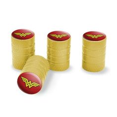 three yellow and red wonder woman's logo knobs on top of each other