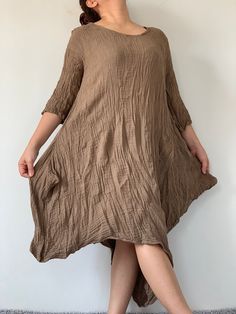 "COTTON GAUZE Long Sleeves Dress, Double Gauze cotton Dress easy to wear, Pullover style Measurements approximately: Shoulder: 18\" Armhole: 20\" Bust: 44\" - 46\" Hips: 48\" Length 36\" Material- DOUBLE GAUZE COTTON ❤️ PAYMENT We accept payments via PayPal only. ❤️❤️ Shipping: via DHL Express. - All items will be shipped within 1 business day after received payment. ❤️❤️ Delivery Time : USA only 3 business days Canada: 3 business days France: 3 business days Germany 3 business days North Americ Oversized Knee-length Cotton Dress, Cotton V-neck Lagenlook Dress, Cotton Tunic Midi Dress For Daywear, Casual Cotton Midi Dress With 3/4 Sleeves, Oversized Cotton V-neck Tunic, Brown Relaxed Fit Cotton Dress, Brown Cotton Midi Dress For Daywear, Oversized Cotton Knee-length Midi Dress, Cotton Tunic For Daywear In Fall