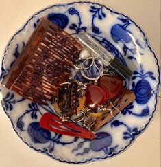 a blue and white plate topped with lots of assorted items