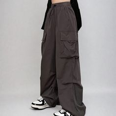 Looking for a versatile and comfortable pair of cargo pants? Check out our wide leg drawstring cuff pants! Made from a lightweight fabric, these pants are perfect for everyday wear. They feature an elastic waistline for a comfortable fit, and drawstring cuffs for a stylish touch. Whether you're running errands or taking a walk in the park, these pants will keep you feeling comfortable all day long.
Gender: WomenMaterial: PolyesterClothing Length: Full LengthWaist Type: Mid-WaistClosure Type: Elastic Waist Utility Wide-leg Cargo Pants With Drawstring, Loosely Fitted Wide Leg Cargo Pants With Drawstring, Streetwear Wide-leg Cargo Pants With Drawstring, Baggy Gray Cargo Pants With Elastic Waistband, Wide-leg Cargo Pants With Drawstring For Streetwear, Wide-leg Drawstring Cargo Pants For Streetwear, Baggy Wide Leg Cargo Pants With Elastic Waistband, Relaxed Fit Wide Leg Cargo Pants With Drawstring, Casual Baggy Cargo Pants With Elastic Cuffs