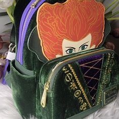 Loungefly - Hocus Pocus Cosplay Winifred Mini Backpack - Palm Exclusive Size: 9"X10.5"X4.5" Material:Crushed Velvet & Vegan Leather Brand New With Original Tags Hocus Pocus Loungefly, Themed Cosplay Backpack, Halloween Standard Backpack With Zipper Closure, Themed Backpack For Cosplay, Themed Red Backpack, Red Themed Backpack Bag, Red Themed Standard Backpack, Themed Green Standard Backpack, Themed Backpack With Case Included