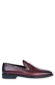 Bring polished style to your wardrobe with this smooth leather loafer featuring a cushioned footbed for superior comfort. Leather upper and lining/synthetic sole Imported Burgundy Slip-on Leather Shoes For Business, Burgundy Slip-on Formal Loafers, Burgundy Slip-on Loafers For Formal Occasions, Burgundy Slip-on Dress Shoes For Business, Burgundy Leather Casual Loafers, Burgundy Leather Loafers For Business, Casual Burgundy Leather Loafers, Burgundy Loafers With Rubber Sole And Round Toe, Casual Burgundy Loafers With Leather Sole