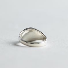 >Modern classic signet ring with hand graving initial. >925 sterling silver hallmarked >Sterling silver is an almost pure metal made from 92.5% Silver. >Approx. 10mmx9mm oval face and 2.5mm band width. FREE SHIPPING USA- All of our jewelry will arrive in custom packaging ready for gift giving. CARE: To prolong the color and shine of your jewelry, avoid contact with perfume, lotion, and water. Store in a bag or jewelry box. SATISFACTION GUARANTEED All pieces are carefully examined pri White Gold Open Signet Ring With Engraving Option, Classic Sterling Silver Dome Promise Ring, Classic Signet Ring With Initials Open Ring, Classic Signet Ring With Initials And Open Ring Shape, Classic Signet Ring With Initials And Open Design, Minimalist Sterling Silver Ring With Initials, Minimalist Sterling Silver Ring With Initials Engraved, Sterling Silver Signet Ring With Polished Finish As Gift, Classic Silver Open Signet Ring