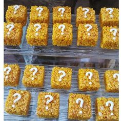 several square treats with question marks on them