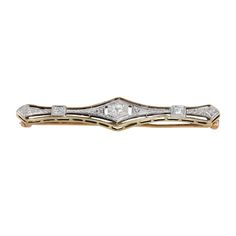 Evoke timeless elegance with our 14K Two-Tone Gold Diamond Antique Vintage Brooch. This exquisite piece features intricate vintage design elements in two-tone gold, adorned with sparkling diamonds totaling 0.10 carats. Perfect for adding a touch of vintage charm and sophistication to any attire. Material: 14K Yellow Gold  Weight: 3.6g Length: 10 mm Wide: 2" Diamonds: Center = 0.06Ctw 2 x 0.02Ctw = 0.04Ctw Color And Clarity: G-H/I1 Total Carat Weigth: 0.10Ctw For more of our jewelry products, ple Ring Bracelet Chain, Real Gold Jewelry, Diamond Brooch, Sell Gold, Vintage Brooch, Gold Filled Jewelry, Sparkle Diamonds, Vintage Brooches, Vintage Charms