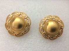 "Vintage ANNE KLEIN AK Gold tone clip-on earrings Very good vintage condition diameter approximately - 1.5\" marked: copyright symbol AK" Vintage Gold Flower Shaped Earrings, Vintage Gold Flower-shaped Earrings, Vintage Flower Shaped Clip-on Earrings, Vintage Round Brass Clip-on Earrings, Vintage Round Metal Clip-on Earrings, Copyright Symbol, Rhinestone Ring, Gold Flower, Metal Necklaces