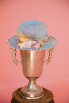 Get ready for the most stylish party of the year with our RACE DAY Party Sun Hat. The blue pastel color exudes a delicate elegance, while the beads and gold pins add the perfect touch of glamour. The floral and feather combo, along with the multicolor rhinestone band, complete this one-of-a-kind hat. This hat is ONE OF A KIND, created by our owner Stephanie. To receive item quicker, expedited shipping is available at checkout. Bohemian Mini Hat For Kentucky Derby Party, Spring Party Beaded Hats, Summer Party Hats Embellished, Summer Party Embellished Hats, Rancher Hat, Derby Party, Blue Pastel, Stylish Party, Gold Pin