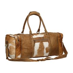 A striking concept for a travelling duffel bag that is constructed to carry the items you may need as well as a durable and stylish bag for a professional business trip, or a week long getaway. Full body covered in brown and white hair-on hide and light brown leather trim. Leather padded straps for added comfort. Importantly, this bag is engineered to be light for the traveller on the go. Materials Leather & HaironItem Width 24"Item Depth 10"Item Height 19"Handle 10"Shoulder 24" Note that the ex Cowhide Bag, Leather Travel Bag, Leather Duffle, Cow Skin, Leather Travel, Stylish Bag, Classic Leather, Travel Gear, Weekender Bag