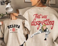 two women wearing sweatshirts with the words you're a total pose on them