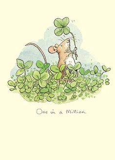 a card with a mouse and clovers on it