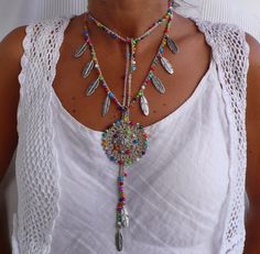 This beautiful necklace was crocheted with beige/ecru waxed cord, glass beads, metal beads and tibetan silver feathers. It can be worn close to the neck or more loose, you just tight it however you like it. The lace is long enough to wrap it 2 times around the neck. Each end of the string is closed by with a few glass beads and a tibetan silver feather. It's one of a kind and will look great in summer or in winter. This crochet necklace is made to order and can me made in different colors. Just Mandala Crochet, Crochet Beaded Necklace, Jewelry Hippie, Beaded Crochet, Boho Hippie Chic, Jewel Necklace, Handmade Beaded Necklaces, Long Beaded Necklace, Crochet Mandala