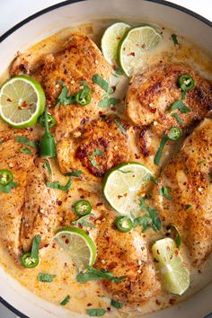 chicken with limes and cilantro in a skillet