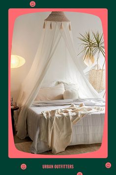 a bed with a white canopy over it