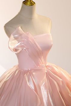 Step into a fairytale with this Elegant Shiny Pink Organza Ball Gown. The enchanting ball-gown silhouette with layers of airy organza flows beautifully to the floor, creating a graceful, voluminous effect that exudes elegance. Its strapless neckline and sleeveless design lend a modern touch, highlighting the neckline and shoulders with a soft, romantic look. The dress is available in a range of captivating colors—from sweet Candy Pink to sophisticated Silver-Gray—ensuring the perfect match for a Organza Quinceanera Dress With Ruffles, Organza Quinceanera Dress With Ruffles For Debutante Ball, Ruffled Organza Quinceanera Dress, Organza Quinceanera Dress With Ruffles For Wedding, Wedding Quinceanera Dress With Ruffles In Organza, Organza Ball Gown With Ruffles For Quinceanera, Princess Organza Ball Gown For Banquet, Princess Style Organza Ball Gown For Banquet, Organza Floor-length Ball Gown For Quinceanera