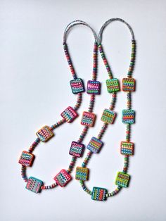 "Polymer Clay square tiles Necklace, reversible, handmade, Wearable Art, colorful jewelry, cool necklace, OOAK, Polymer Art, Polymer clay jewelry, contemporary jewelry, one of a kind, unique necklace, urban necklace, daily necklace, easy to wear. Every bead is different to each other. This necklace has no clasp. I used crimp beads to secure the thread and prevent the beads from being unstrung. Length: 32\". Weight: 65 gr. See more...https://www.etsy.com/listing/540502838/polymer-clay-necklace-wearable-art" Artsy Multicolor Everyday Jewelry, Multicolor Square Beaded Jewelry, Handmade Rectangular Everyday Necklace, Everyday Handmade Rectangular Necklaces, Multicolor Square Jewelry For Gifts, Multicolor Square Jewelry Gift, Everyday Handmade Rectangular Necklace, Handmade Multicolor Rectangular Jewelry, Adjustable Multicolor Rectangular Beaded Necklaces