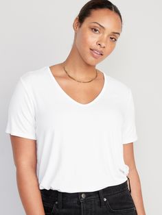 v-neck short sleeves relaxed fit hits below waist models are approx.  5'9" and wear sizes s (4), l (12), and xl (18)Machine wash cold, tumble dry low.  spandex 5% rayon 95% Casual Everyday V-neck Top With Short Sleeves, White Relaxed Fit V-neck Top, Casual White Relaxed Fit V-neck Top, White Short Sleeve V-neck Top For Everyday, V-neck Short Sleeve Top For Summer, Everyday V-neck Short Sleeve Top For Summer, White V-neck Short Sleeve Top, Summer Short Sleeve V-neck Top For Loungewear, Relaxed Fit Short Sleeve V-neck Top For Everyday