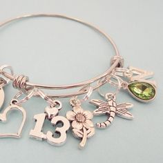 "This empowering girls thirteenth birthday charm bracelet is part of our new line. Each bracelet has a message meant to inspire your girl to be all she can be....and to believe in herself! The packaging goes along with the themeevery girl is a superhero! This 13th birthday girl gift was created and hand crafted with great care and pride in our craft. All of our items, including this personalized 13th birthday charm bracelet are special handmade creations that are original Hope is Hip designs. Ou Hypoallergenic Charm Bracelet For Mother's Day Birthday Gift, Hypoallergenic Charm Bracelet For Birthday And Mother's Day, Cute Silver Charm Bracelet For Birthday, Cute Nickel-free Charm Bracelet For Birthday, Charm Bracelet For Birthday And Mother's Day, Cute Charm Bracelet For Birthday And Valentine's Day, Hypoallergenic Charm Bracelet For Birthday And Valentine's Day, Adjustable Birthstone Bracelets For Birthday, Birth Flower Bracelets For Birthday And Mother's Day