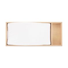 an empty napkin in a wooden box on a white background