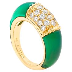 18ct gold Very Rare Van Cleef & Arpels PHILIPPINES ring Set with 2 polished green Chrysoprase hard stones either side of a Diamond Pave centre. Van Cleef & Arpeks arguably the Master of all French Maisons presents this absolute classic style, and beautiful example for a VCA collector. Signed: VCA Makers mark 750 (18ct) Elegant Green Enamel Ring With Polished Finish, Green Enamel Ring For Formal Occasions, Formal Green Enamel Ring With Polished Finish, Elegant Green Oval Enamel Ring, Hallmarked Green Enamel Ring For Anniversary, Formal Oval Green Enamel Ring, Green Hallmarked Enamel Ring For Anniversary, Formal Green Oval Enamel Ring, Green Oval Enamel Ring For Formal Occasions