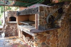 an outdoor oven built into the side of a building