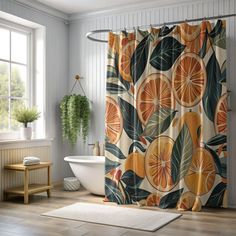 an orange shower curtain in a bathroom next to a bathtub and window with potted plants