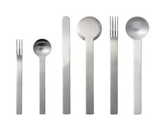 an assortment of stainless steel utensils and spoons