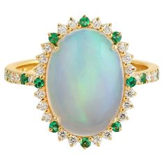 Check out this item from 1stdibs! 3.26 Carats Opal Emerald Diamond 14 Karat Gold Ring: https://www.1stdibs.com/id-j_19024982 5 Carat Diamond Ring, Vintage Cocktail Ring, Gold Cocktail Ring, Modern Ring, Color Ring, Top Seller, Gem Stone, Love Ring, Gold Jewelry Fashion