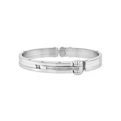 Always pick a jewelry piece that inspires confidence. Consider this mens diamond and stainless steel cuff bracelet. This structured mens piece is polished to a high gleam and features 20 round diamonds on a single row. A hinged clasp secures the bracelet to your wrist so you never have to worry losing it. Stainless steel is tarnish-resistant and hypoallergenic. With proper care, this durable bracelet will last years on your mens jewelry collection. This piece is an ideal gift for men for any occ Hinge Bracelet, Men Bracelet, Expensive Jewelry, Hinged Bracelet, Gemstone Bracelets, Gift For Men, Buy 1, Bracelets For Men, Hinges