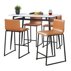 a table with four chairs and a wine glass