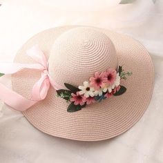 Description: Whether you are preparing to go out on a beautiful nature picnic date, going out to an outdoor wedding ceremony, or preparing for your vacation at the beach, this is the gorgeous sun hat for you! It is artistically designed with intricate details of beautiful flowers, and a sturdy straw hat, for you to enjoy in the many years to come! Details: OZYC Women's Fashion Spring Summer Flower Straw Hat Exquisite Floral Straw Dressy Outdoor Wedding Vacation Beach Hat Floral Bow Sun Hat for W Hats Nike, Nature Picnic, Haku Lei, Hats Fedora, Hats Beach, Womens Beach Hat, Hats Knitted, Hats Beanie, Hats Summer