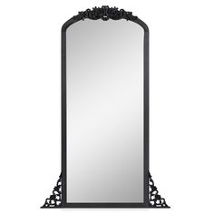 an ornate black mirror on a white background