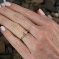 This circa 1940s solitaire engagement ring is centered with an old mine cut diamond, weighing 0.33 carats, in a six-prong buttercup setting. The ring measures 7.4mm at the top, rises 7.7mm above the finger, tapering to 1.4mm wide and 0.9mm thick at the base of the shank. This ring is currently a size 5.5 and we offer complimentary resizing to fit. Buttercup Ring Setting, Vintage 14k Gold Flower Ring With Rose Cut Diamonds, Antique 14k Gold Solitaire Ring, Victorian Yellow Gold Rings With Rose Cut Diamonds, Old Mine Cut Engagement Ring Gold, Buttercup Ring, Solitaire Engagement, Solitaire Engagement Ring, Diamond Cuts