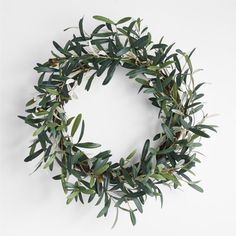 an olive leaf wreath on a white background