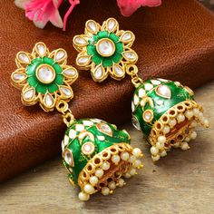 Fancy Party Wear Traditional Earrings. Perfect with ethnic & traditional wear. Perfect gift for any occasion for yourself and your dear ones. It is advisable to store jewellery in a zip lock pouch (air tight pouch), keep away from water perfume and other chemicals and clean it with dry and soft cloth. Traditional Jhumkas For Eid Festival, Traditional Jhumkas For Eid Festivities, Traditional Jhumkas For Eid, Traditional Jhumkas For Eid Celebration, Traditional Cutdana Jhumkas For Eid, Festive Traditional Cutdana Jhumkas, Festive Traditional Jhumkas With Cutdana, Traditional Green Jhumkas For Wedding, Bollywood Style Jhumkas For Eid Celebration