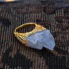 GemFormingStudio D E T A I L S Crystal Ring | Raw Crystal Ring | Ring For Her | Ring For Women | Gift For Her | Gift For Women | Electroplated Ring | Brass Ring [GFS3028] Stone mm: 30X20 MM Ring Size : 6.5 Gram : 13.20 GM Color : White Material : Brass Polish : Gold Plated Contact us for wholesale prices. R I N G S https://www.etsy.com/in-en/shop/GemFormingStudio?section_id=22783374 B E A D S https://www.etsy.com/in-en/shop/GemFormingStudio?section_id=22828835 W A N D S https://www.etsy.com/in-e Spiritual Open Ring Crystal Promise Ring, Minimalist Crystal And Metal Ring As A Gift, White Spiritual Crystal Open Ring, Spiritual White Crystal Open Ring, Gold Spiritual Crystal Promise Ring, Brass Polish, Rough Stone Ring, Raw Crystal Ring, Her Ring