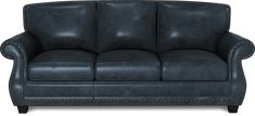 a black leather couch with studding on the armrests and nail polishing